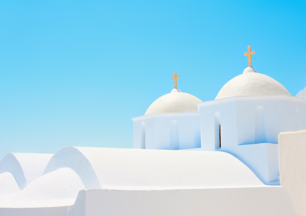 2 Beautiful old white twin churches in Chora the capital of Amorgos island in Greece