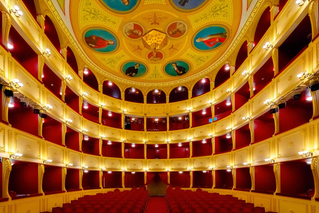 ERMOUPOLIS - JULY 2017: Interior of the famous Apollo Theatre by the Italian architect Pietro Campo in Syros Island. Its a miniature version of the La Scala in Milano